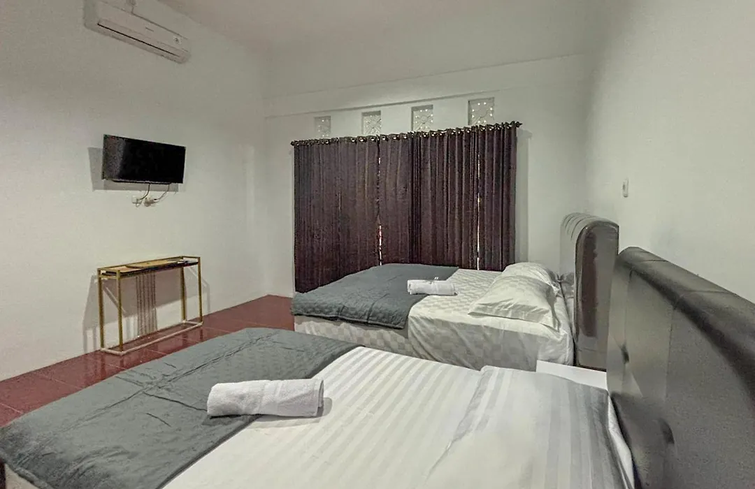 Tini'S Guest House Malang Mitra Reddoorz-1